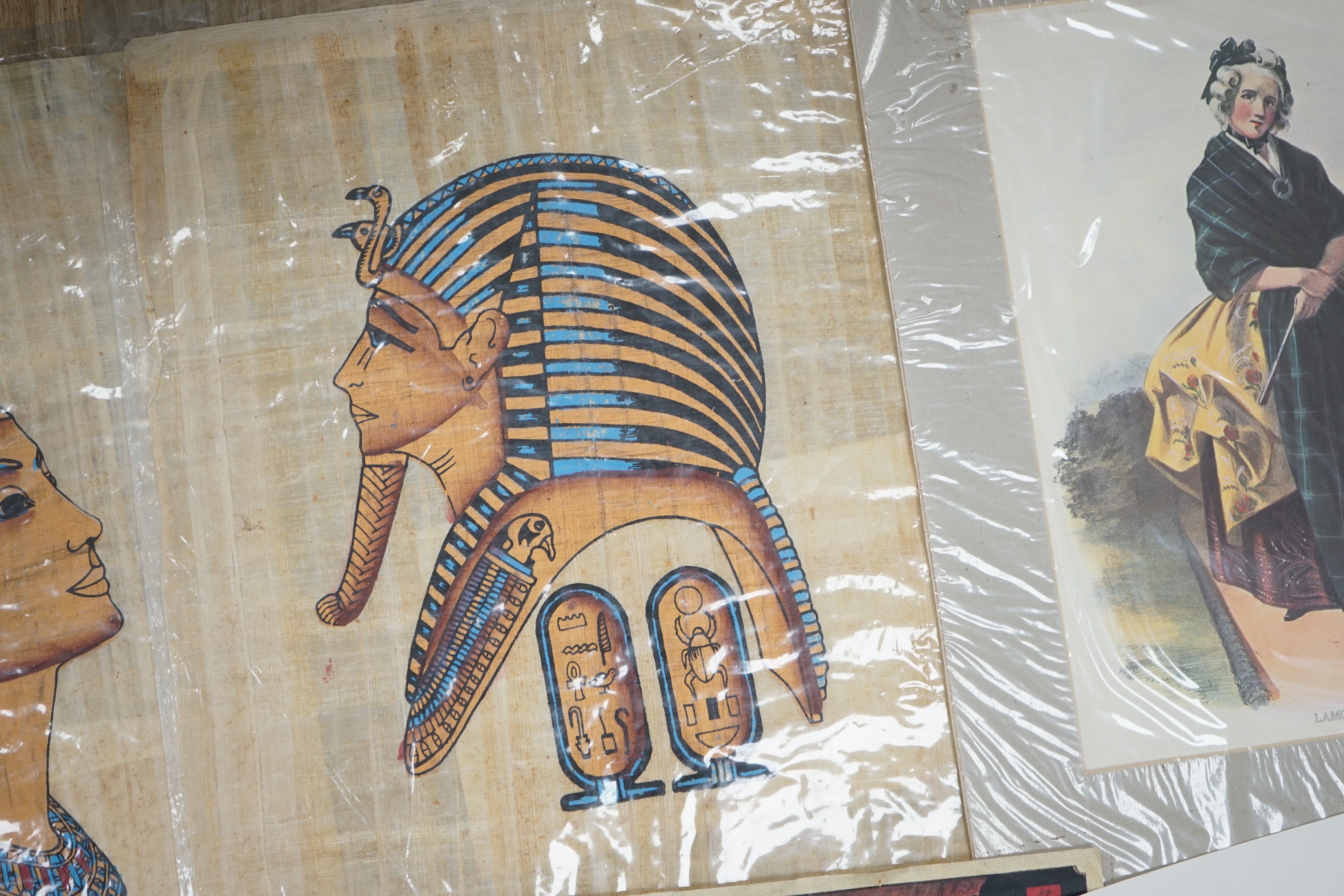 A group of assorted pictures and prints including Egyptian papyrus paintings, 41 x 33cm